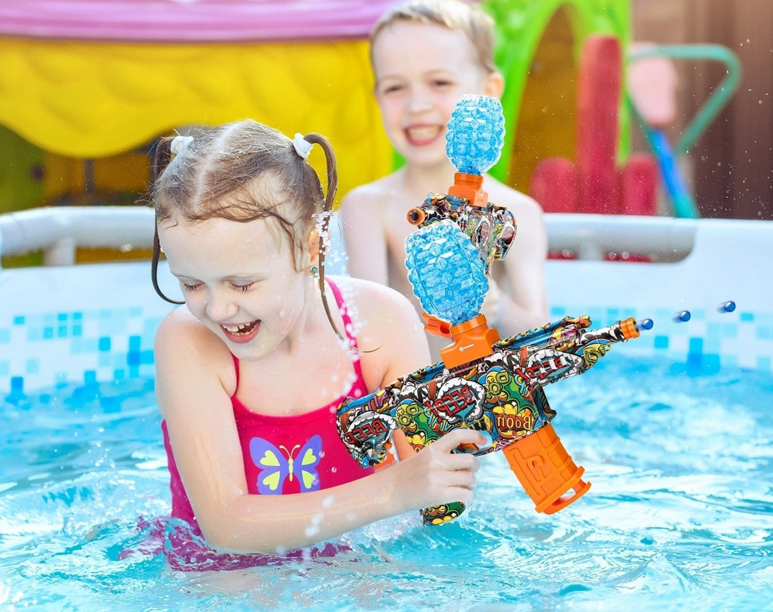 Two children playing with water guns using blue gel beads in a pool.