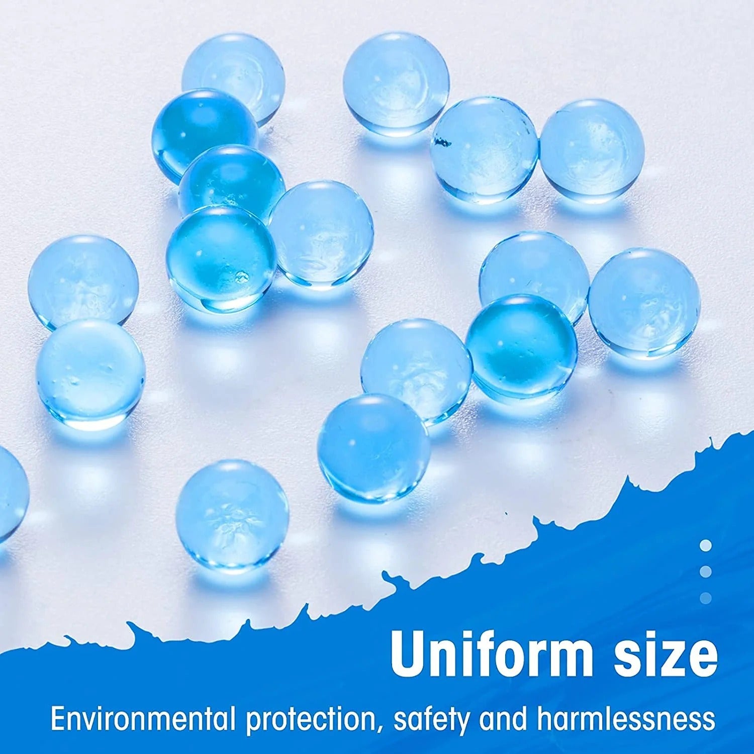 Blue glass marbles on a white background with text about uniform size, environmental protection, safety, and harmlessness.