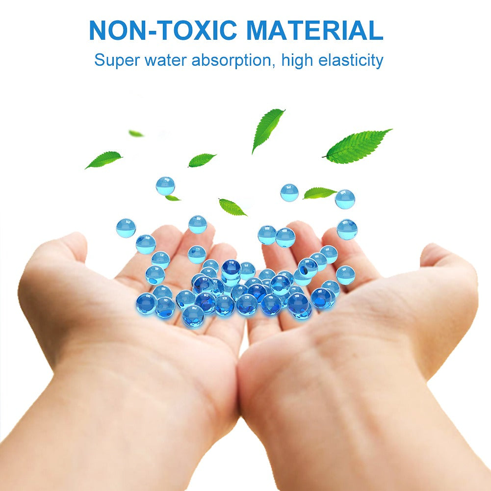 Blue gel beads held in hands with green leaves, emphasizing non-toxic material and water absorption properties.